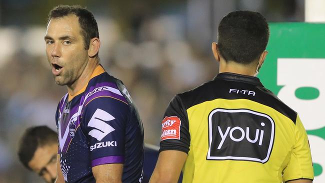 Cameron Smith of the Storm gestures after Cronulla were awarded a penalty