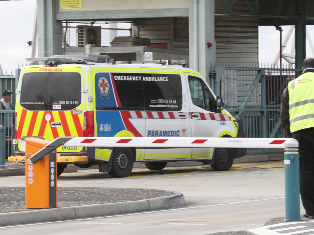 An ambulance arrives on the dock at Station Pier. Picture: David Crosling