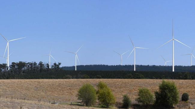 A photo montage shows the superimposed Delburn Wind Farm turbines within the pine forest. Picture: OSMI