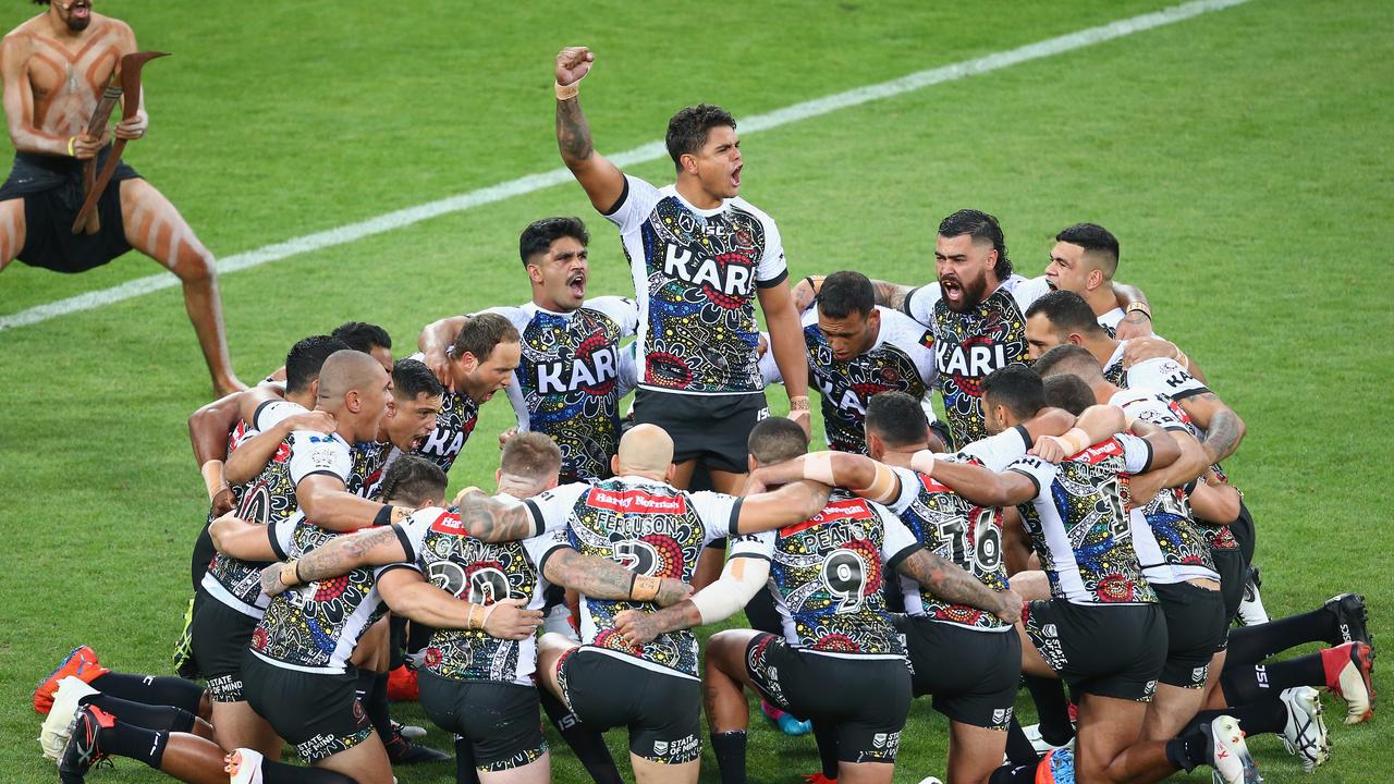 Latrell Mitchell leads the Indigenous war dance. (Photo by Mike Owen/Getty Images)