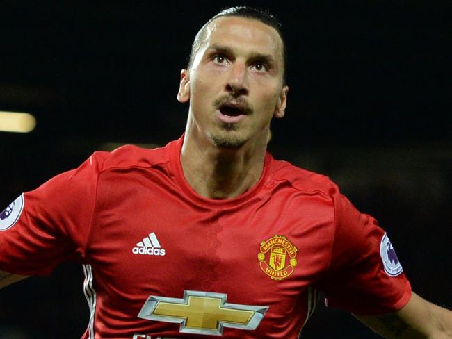 (FILES) This file photo taken on August 19, 2016 shows Manchester United's Swedish striker Zlatan Ibrahimovic celebrates after scoring their second goal from the penalty spot during the English Premier League football match between Manchester United and Southampton at Old Trafford in Manchester, north west England, on August 19, 2016. Zlatan Ibrahimovic has rejoined Manchester United on a one-year contract on August 24, 2017 after the Swedish star's spell with the Premier League side was curtailed by a serious knee injury last season. Ibrahimovic missed the final weeks of United's campaign after suffering ligament damage in a Europa League clash against Anderlecht in April 2017.  / AFP PHOTO / Oli SCARFF / RESTRICTED TO EDITORIAL USE. No use with unauthorized audio, video, data, fixture lists, club/league logos or 'live' services. Online in-match use limited to 75 images, no video emulation. No use in betting, games or single club/league/player publications.  /