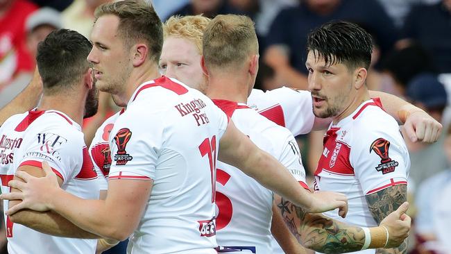 Gareth Widdop of England celebrates after scoring a try.