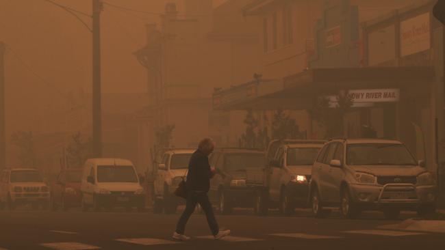 The main street of Orbost is covered in thick smoke on Thursday. Picture: David Crosling