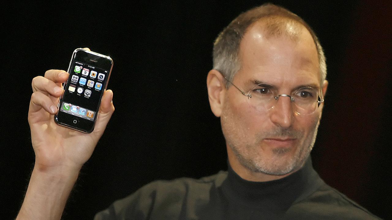 Apple chief executive Steve Jobs unveiled the first iPhone on January 9, 2007 at the MacWorld Conference in San Francisco. Picture: AFP / Tony Avelar