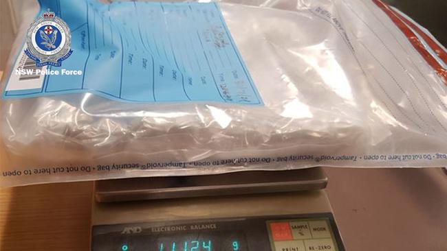 A man has been charged after more than 2kg of heroin was found in two clear sealed plastic bags during a taxi stop in Newtown. Picture: NSW Police