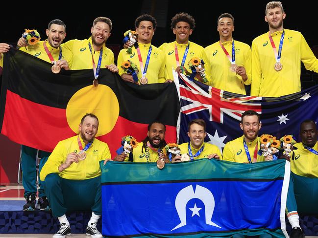 Patty Mills and Australia celebrates winning the Bronze medal playoff Basketball game between Australia and Slovenia at the Saitama Super Arena during the Tokyo 2020 Olympics. Picture: Adam Head