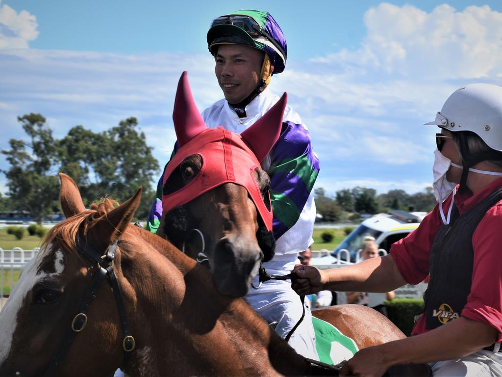 Jockey Allan Chau attempts to settle Daniel S Bowen trained Epplause in the mounting yard before it was ultimately scratched at the gates at Clarence River Jockey Club in Grafton on Tuesday, 2nd February, 2021. Photo Bill North / The Daily Examiner