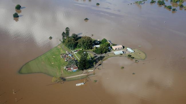 Flooded houses near Windsor, NSW, seen from the air in March. Picture: Dylan Coker