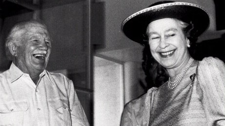 Reginald Murray Williams, founder of bushman's outfitting clothing merchandise empire RM Williams, with Queen Elizabeth II at Stockmans Hall of Fame at Longreach, Queensland 1988.