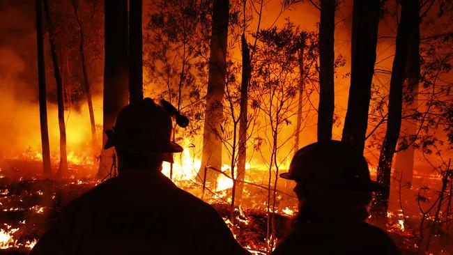 Crews monitor fires and begin back burns between the towns of Orbost and Lakes Entrance in East Gippsland during the current fire crisis. Picture: Darrian Traynor/Getty Images.