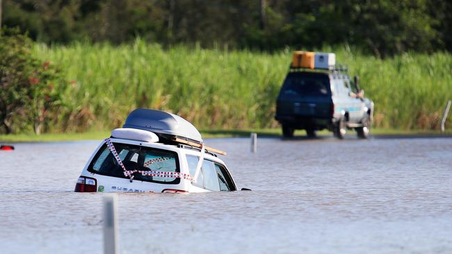 A man and women from Nimbin needed rescuing by Murwillumbah SES Flood Rescue Officers early this morning when they drove through the heavily flooded Tweed Valley Way disobeying Road Closed signs.Photo Scott Powick Daily News