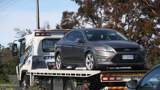 Tasmania Police investigating a body found in Carbeen Street Mornington. Car towed from scene.  Picture: NIKKI DAVIS-JONES