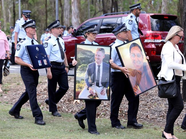 Mourners at the memorial service with full police honours for fallen constables Rachel McCrow and Matthew Arnold at Brisbane Entertainment Centre. Picture: Steve Pohlner