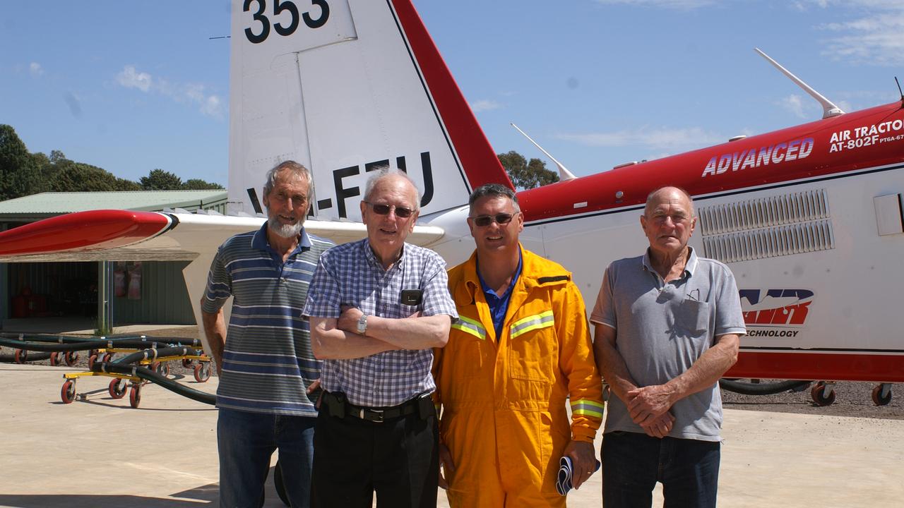 Flying high: CFA volunteers David Davis, Leighton Wraith, Paul Batista and Neil Sandford are all part of the Hamilton Air Base ground crew that fills aircraft with retardant during bushfire emergencies.