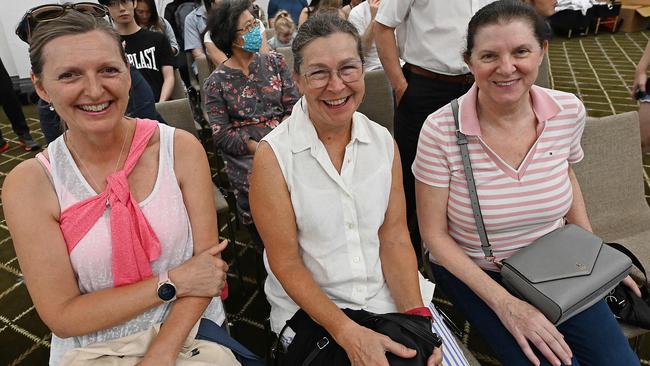 Elaine Davies, Gabrielle Baker and Jennifer Hunt wait for their shot at a free influenza immunisation event at the Brisbane Town Hall. Picture: Lyndon Mechielsen/Courier Mail