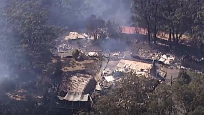 Smouldering: an aerial view of Binna Burra Lodge after it was devastated by bushfires.