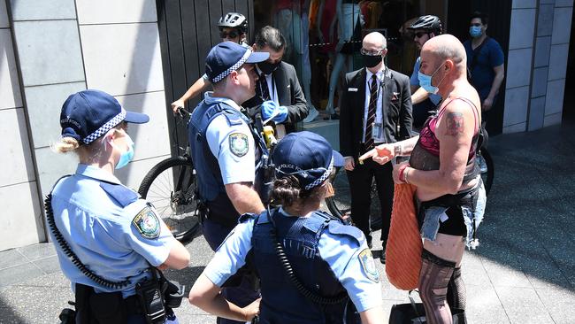 Police are ensuring people are wearing masks at indoor venues such as shopping centres. Picture: News Corp Australia