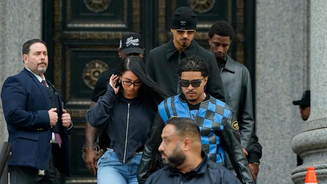 Diddy’s sons Justin Combs and Christian Combs leave the federal court after their father's bail hearing in New York on September 18.