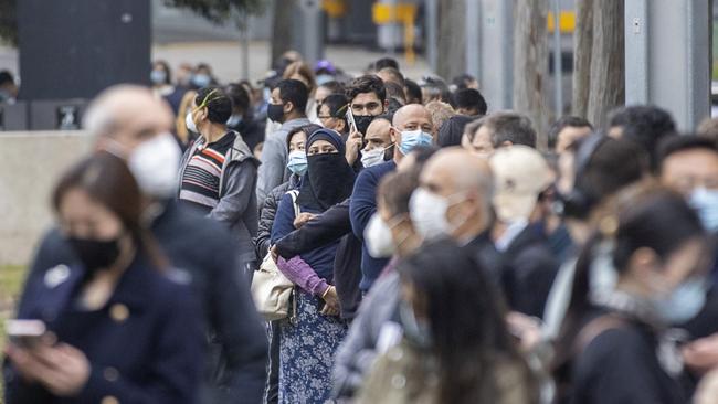 Long queues of people are seen at the NSW Vaccination Centre in Homebush. Picture: Getty Images