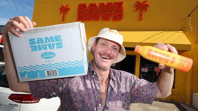 Charlie Beauchamp shows off his product in front of the new store. Picture Glenn Hampson