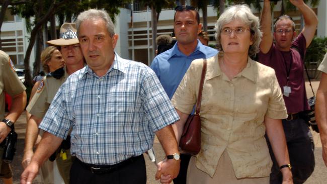 Peter Falconio’s parents Luciano and Joan Falconio hold hands and walk away from the Darwin Supreme court after Bradley Murdoch was given a 28 year nonn-parole period.