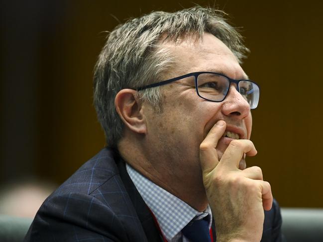 Deputy Governor of the Australian Reserve Bank (RBA) Guy Debelle reacts during a hearing of the House Economic Committee at Parliament House in Canberra, Friday, August 9, 2019. (AAP Image/Lukas Coch) NO ARCHIVING