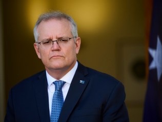 CANBERRA, AUSTRALIA - AUGUST 23: Australian Prime Minister Scott Morrison discusses the Government's plan to 'live with the virus' during a press conference at Parliament House on August 23, 2021 in Canberra, Australia. Federal parliament has resumed in Canberra, despite the ACT being in lockdown due to growing COVID-19 cases. NSW and Victoria are also currently in lockdown as health authorities work to contain the spread of the highly contagious Delta strain of the coronavirus. (Photo by Rohan Thomson/Getty Images)