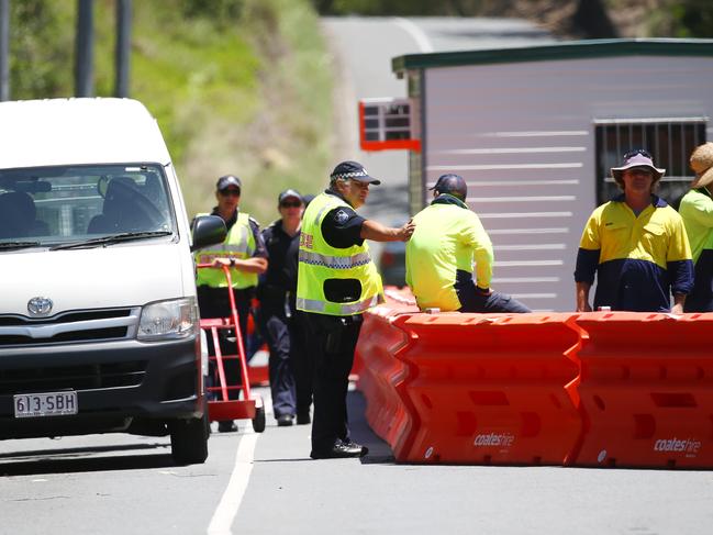 The border restrictions have been stepped up. Police setting up barriers in Miles Street, Coolangatta.Picture: NIGEL HALLETT