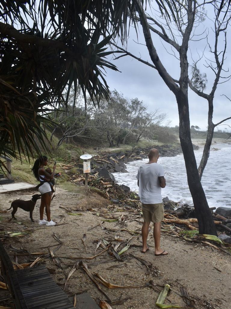 Main Beach in Byron Bay remained closed but many visitors and residents decided to check out the high tide on Tuesday morning.