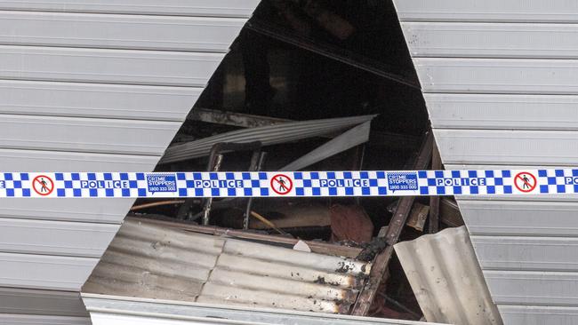 Damage at the tattoo studio after the attack. Picture: AAP/Richard Walker