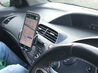 The driver was nabbed for using a phone cradle while driving.  Picture: NSW Police