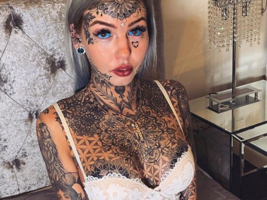 Amber has had 200 tattoos on her body, had her tongue split and her earlobes stretched. Picture: amber__luke/Instagram