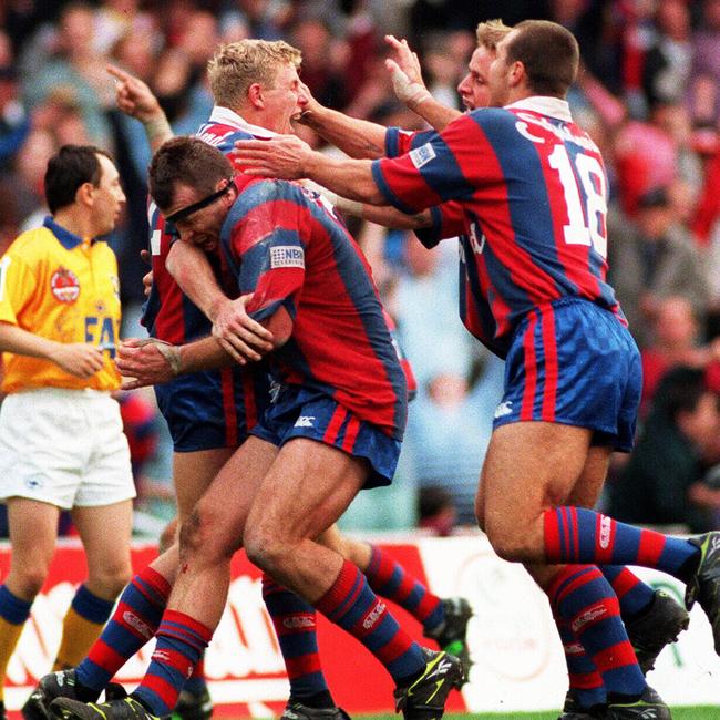 Darren Albert after scoring the winning try in the 1997 grand final.