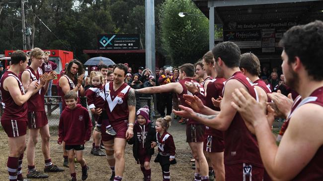 Steve Martin enters the field with family ahead of his 3000th game. Picture: James Ross.