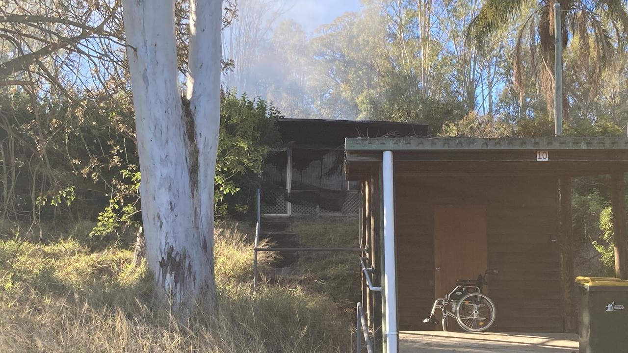 Police said the flames which gutted the Woolooga home reached more than 12m into the sky at points.