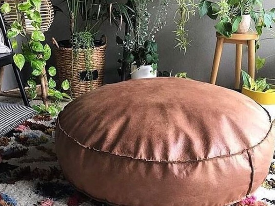 Quality pieces, like this oversized leather cushion from Onyx and Smoke are vital.