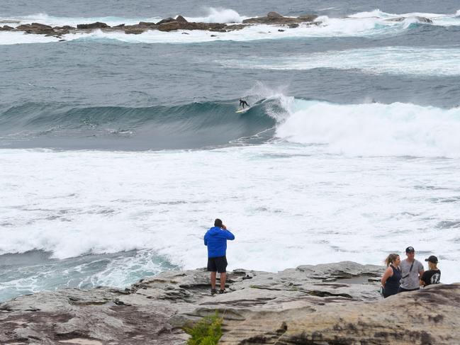 The large swells on Saturday, off Wedding Cake Island at Coogee. Picture: NCA NewsWire/Simon Bullard