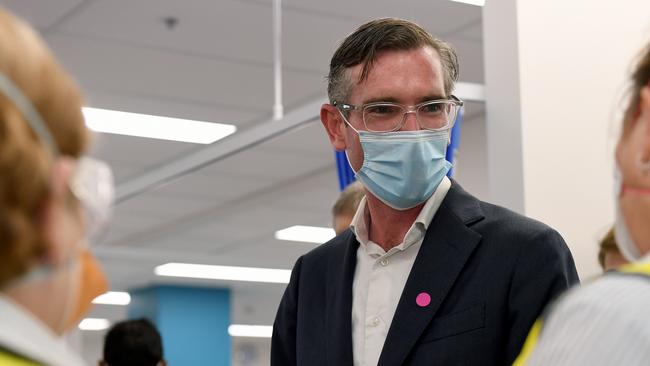 NSW Premier Dominic Perrottet speaks to health workers during a visit to the South Western Sydney Vaccination Centre at Macquarie Fields. Picture: Bianca De Marchi