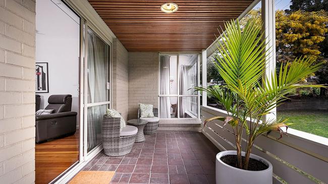 An undercover area, outside the dedicated home theatre.