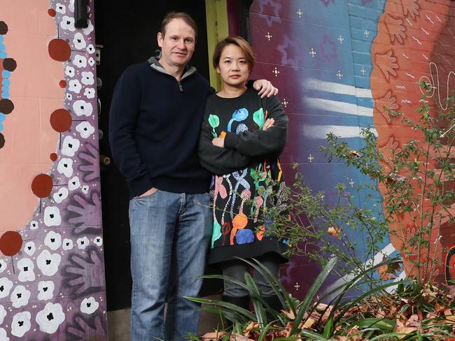 Pictured standing near a troublesome tree out the front of his property in Redfern is Matthew Barnett and his partner Diane Barnett.The local council is refusing to pay him for $17,000 worth of work he did to fix pipes damaged by tree roots. Picture: Richard Dobson