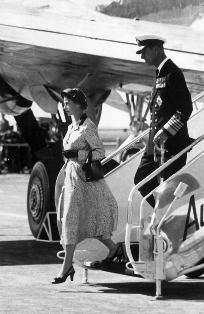 Queen Elizabeth II and Prince Philip arrive at Essendon Aerodrome to begin their Melbourne tour in 1954. Picture: HWT Library.