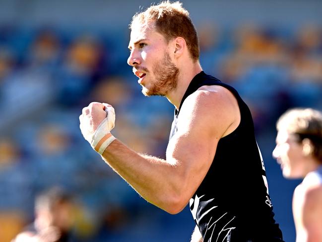 BRISBANE, AUSTRALIA - JULY 19: Harry McKay of Carlton celebrates kicking a goal during the round 7 AFL match between the Carlton Blues and the Port Adelaide Power at The Gabba on July 19, 2020 in Brisbane, Australia. (Photo by Bradley Kanaris/Getty Images)