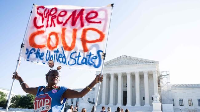 A protestor is seen outside of the US Supreme Court on the first day of a new term in Washington, DC, on October 7. Picture: AFP