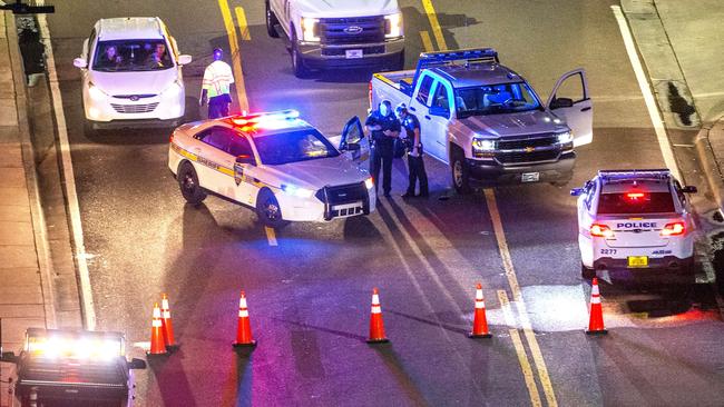 A heavy police presence remains into the night at the shooting at Jacksonville Landing, Florida. Picture: Getty.