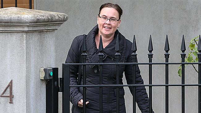 Ms Garrett outside her home in Carlton. Picture: Ian Currie