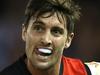 Another banned Bomber re-signs