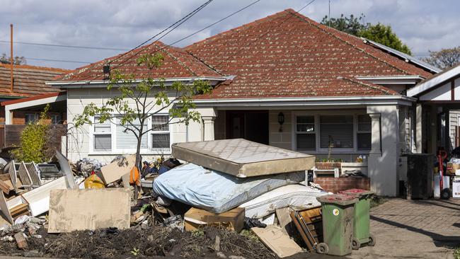 Piles of flood-damaged furniture line Clyde Street in Maribyrnong, inner Melbourne, after recent flooding. Picture: NCA NewsWire / Aaron Francis