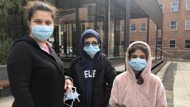 Mother Nigar Faraj, 45, with her children Hawlan, 12 and Hanya, 9, who attend Parramatta Public School.