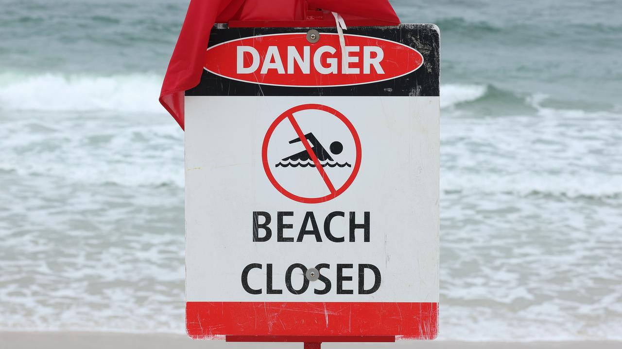 Beach Closed sign at Woorim beach, Bribe Island. Picture: Liam Kidston