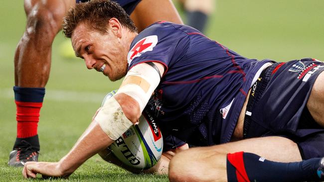 MELBOURNE, AUSTRALIA - FEBRUARY 23:  Dane Haylett-Petty of the Rebels scores a try with Tom English of the Rebels during the round two Super Rugby match between the Melbourne Rebels and the Queensland Reds at AAMI Park on February 23, 2018 in Melbourne, Australia.  (Photo by Daniel Pockett/Getty Images)